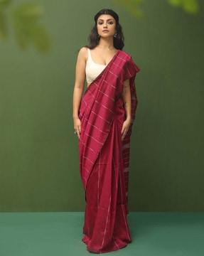 women striped jamdani saree