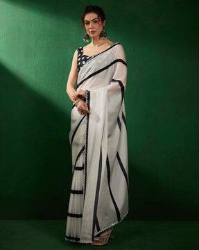 women striped pattern saree with contrast border