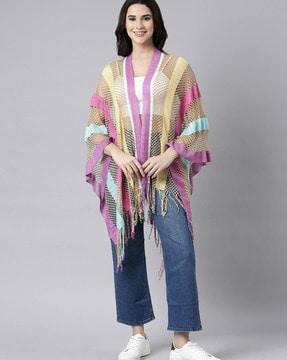 women striped poncho with tassels