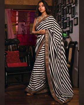 women striped saree with contrast border