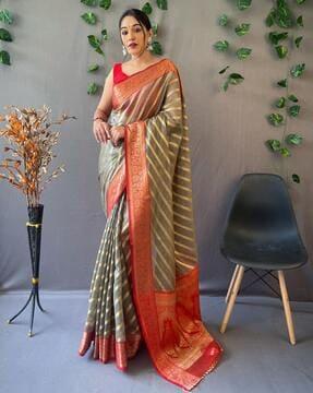 women striped saree with contrast border