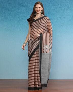 women striped saree with contrast border