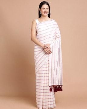 women striped saree with tassels