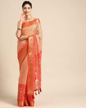 women striped saree with tassels