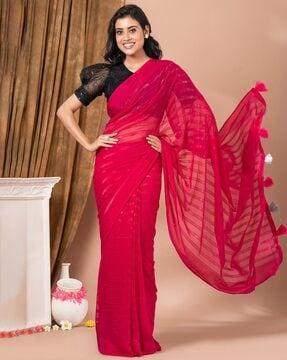 women striped saree with tassels