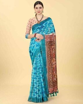 women striped saree with tassels