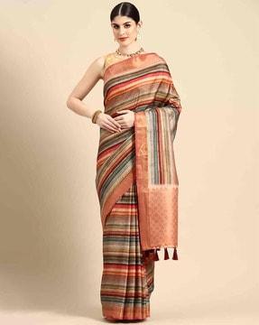 women striped saree with tassels