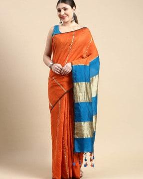 women striped saree with tassels