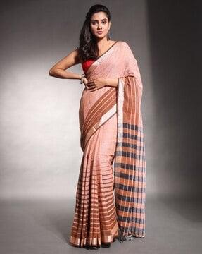 women striped saree with tassels