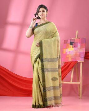 women striped saree with tassels