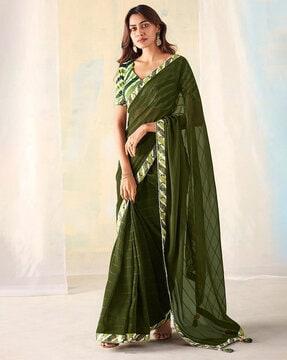 women striped saree with tassels