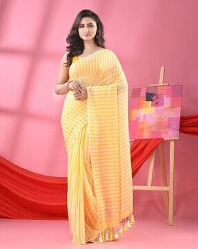 women striped saree with tassels