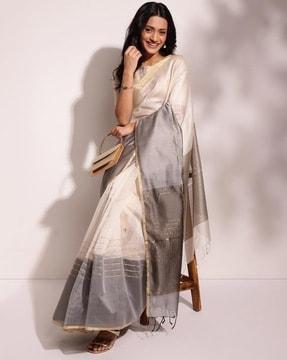 women striped saree with tassels