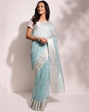 women striped saree with tassels