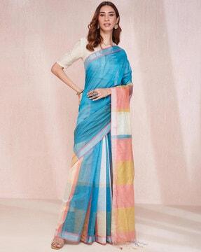 women striped saree with tassels