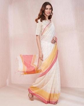 women striped saree with tassels