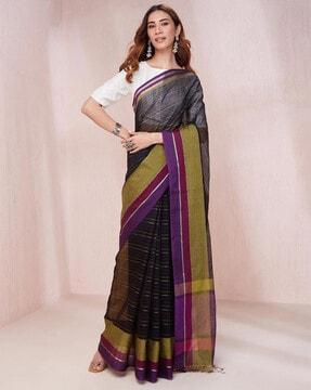 women striped saree with tassels