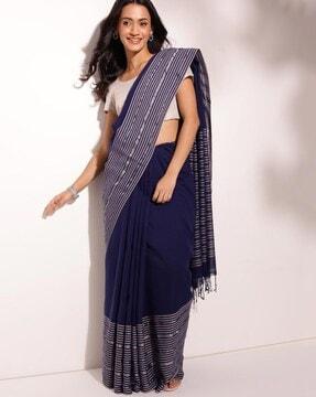 women striped saree with tassels