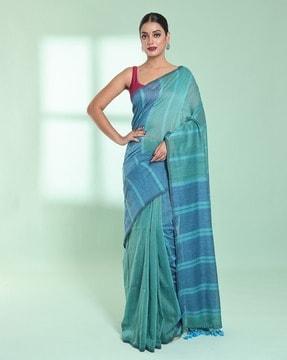 women striped saree with tassels