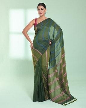 women striped saree with tassels