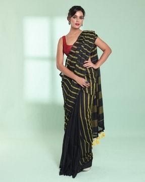 women striped saree with tassels