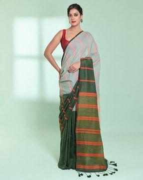 women striped saree with tassels