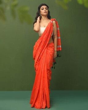 women striped saree with tassels