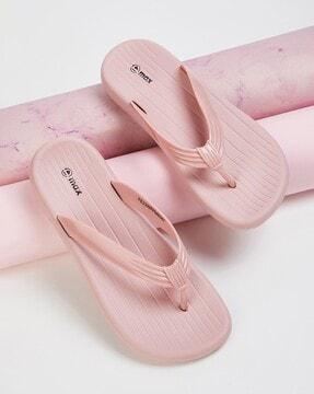 women striped thong-strap flip-flops