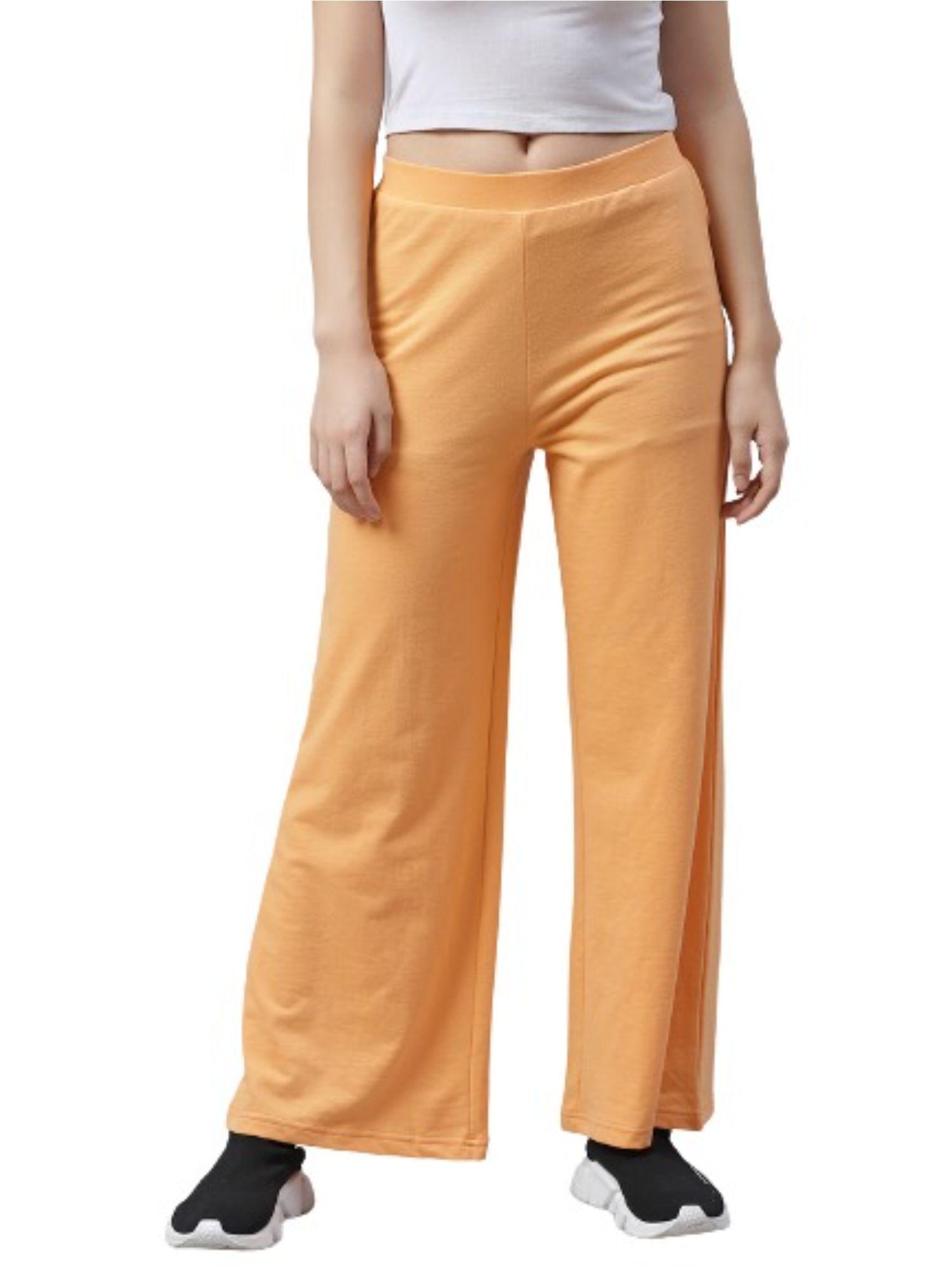 women stylish orange sweatpant