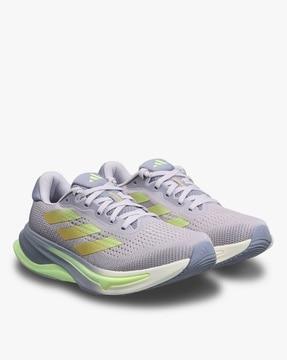 women supernova control running shoes