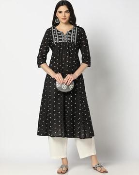 women swiss dot flared kurta