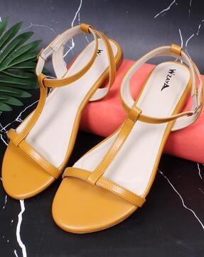 women t-strap flat sandals with buckle closure