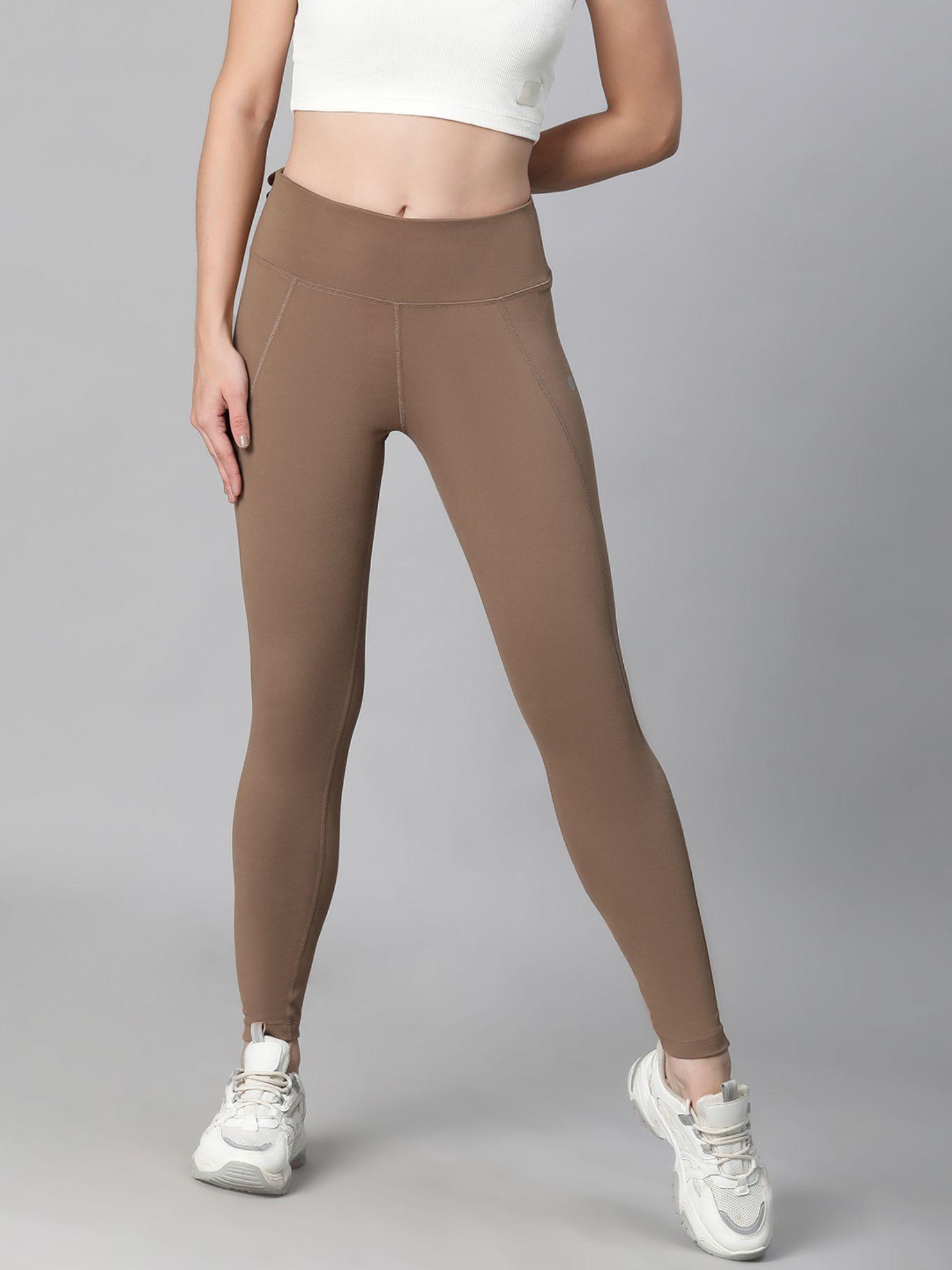 women tan brown training tights