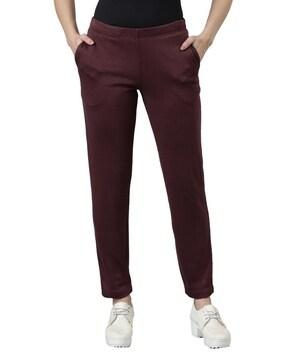 women tapered fit mid-rise flat-front pants