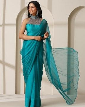 women tasseled chiffon saree