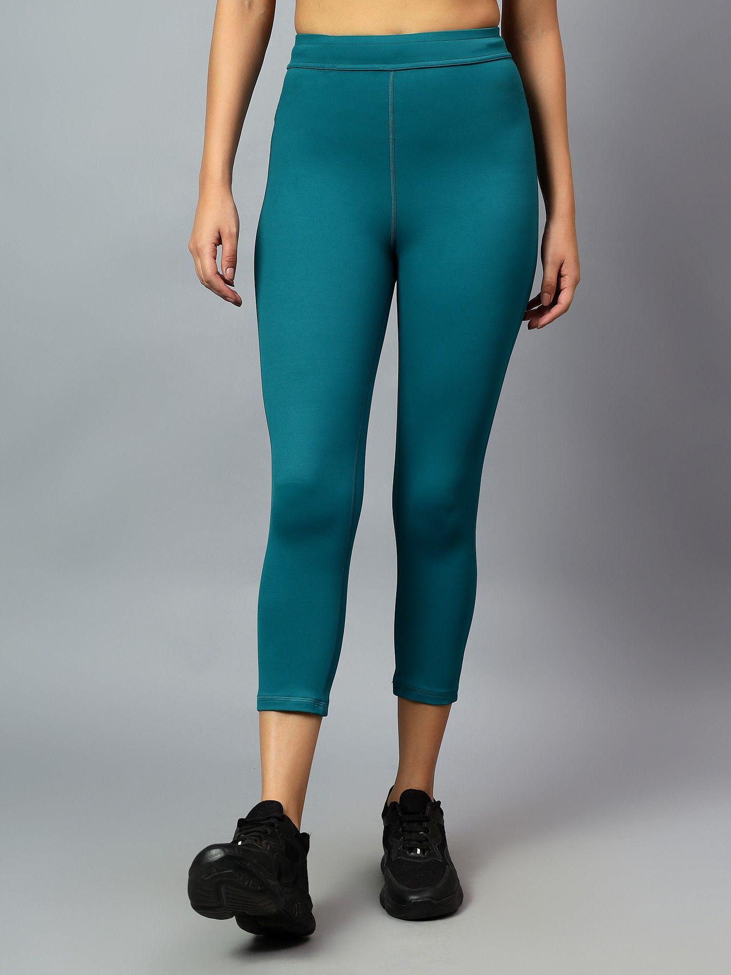 women teal green tight with zipper pocket