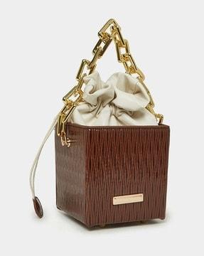 women textured drawstring closure hand bag with wide chain