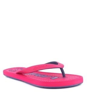 women thong-strap flip-flops with brand applique