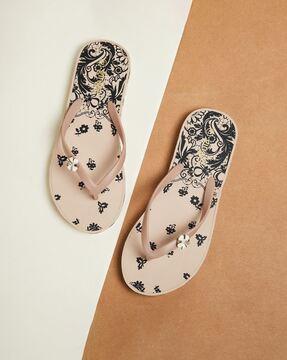 women thong-strap flip-flops with floral print footbed