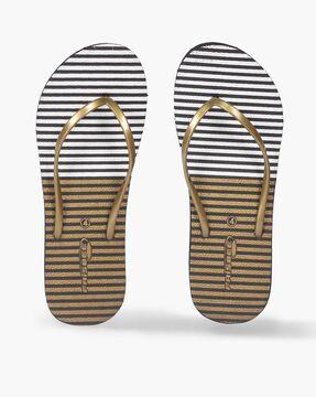 women thong-strap flip-flops with striped footbed