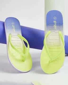 women thong-strap flip-flops with typographic embossed footbed