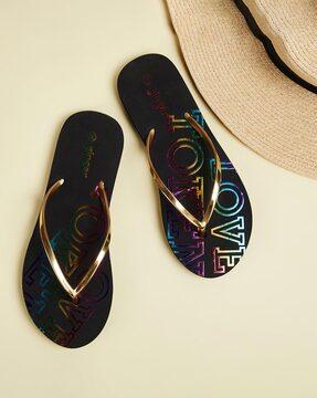 women thong-strap flip-flops with typographic print footbed