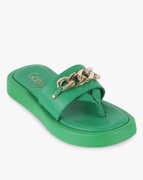 women thong-strap slip-on sandals with metal accent