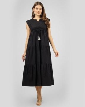 women tiered dress with tasseled