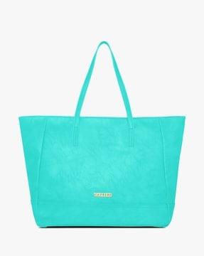 women tote bag with metal accent logo