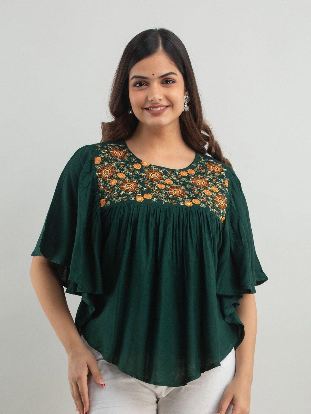 women touch embroidered top