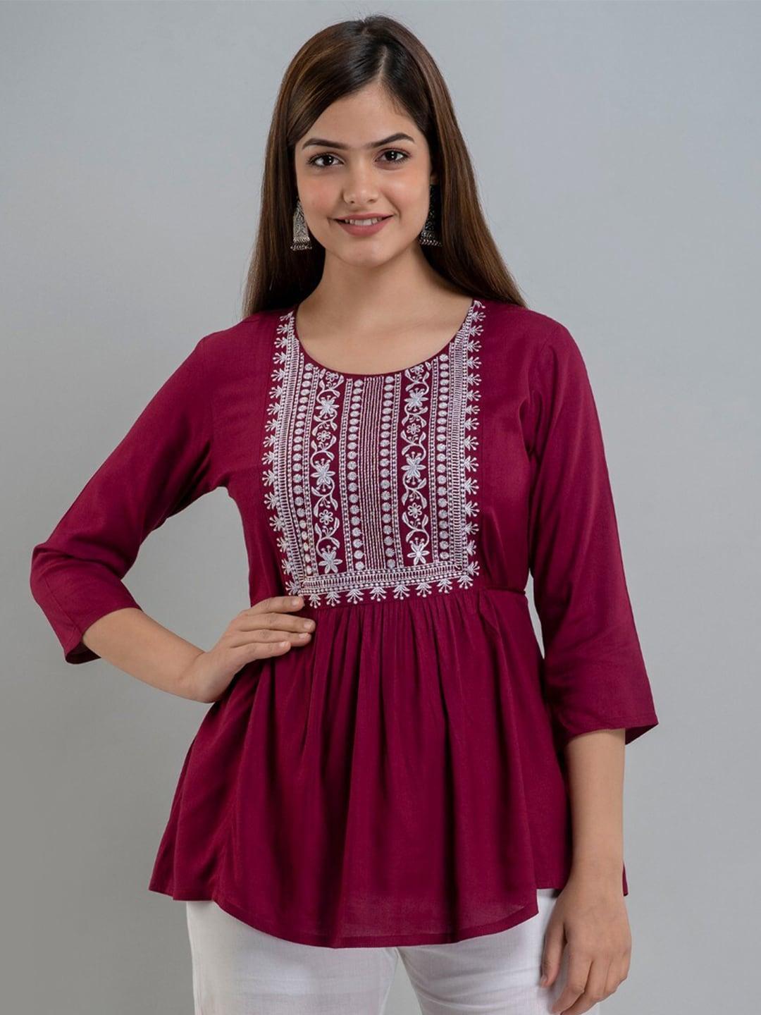 women touch ethnic motifs embroidered top
