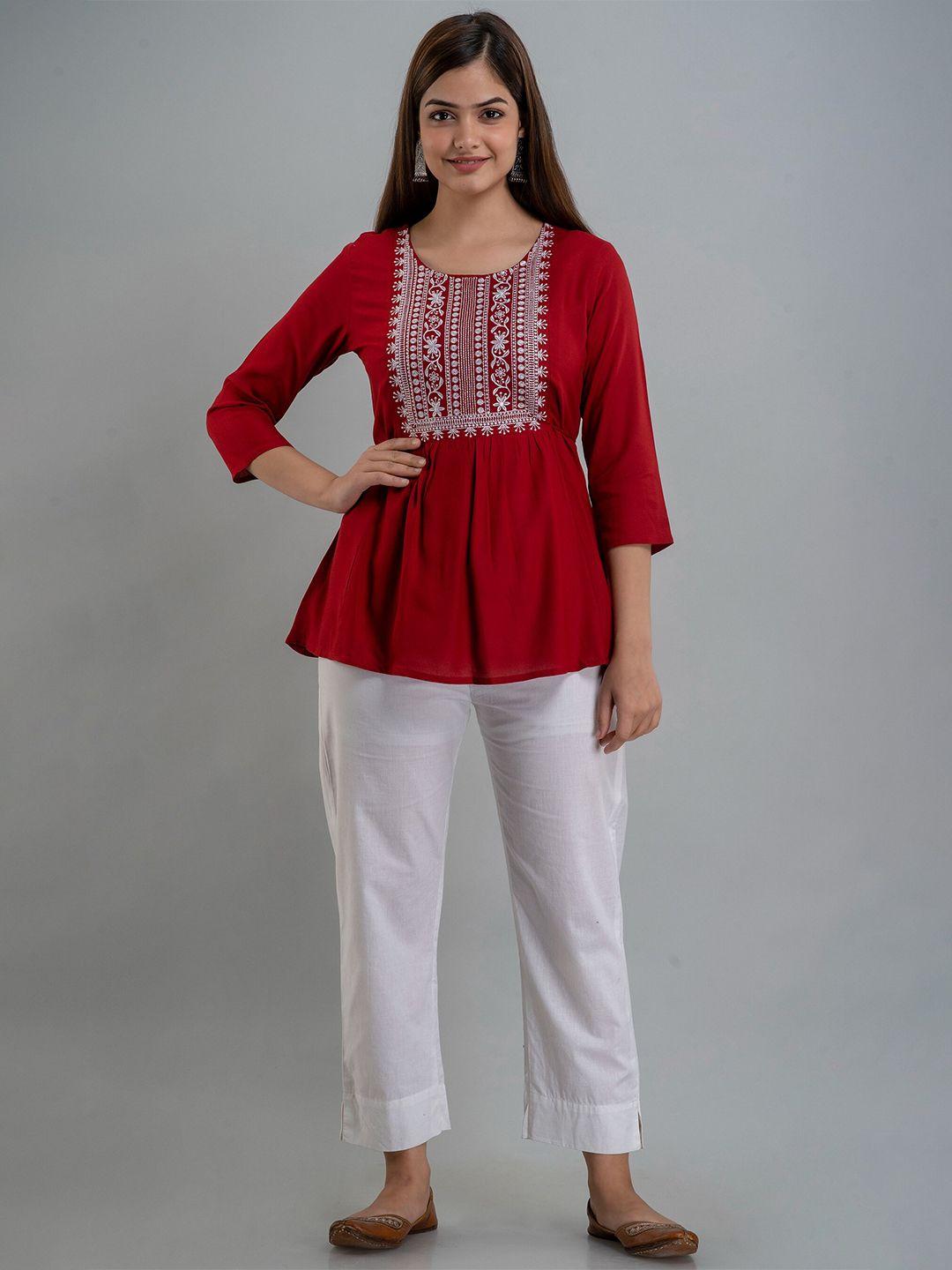 women touch red embroidered peplum top