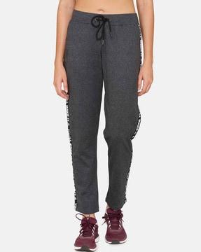 women track pants with contrast stripes