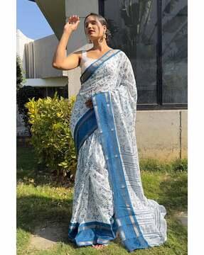 women tribal print saree with contrast border